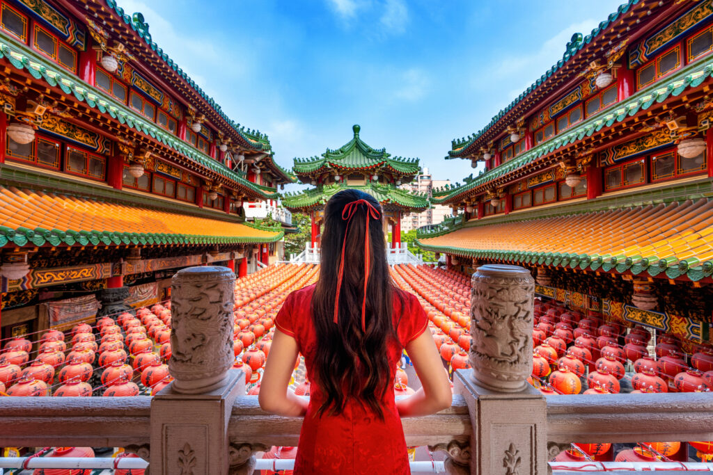 Asian woman wearing traditional Chinese dress at Sanfeng Temple